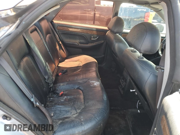 2004 Hyundai XG z VIN KMHFU45E64A320817, wystawiony jako Copart lot #58951955 z przebiegiem 179 978 mil mil oraz Nie do naprawy • Non repairable. Historia ofert i sprzedaży dostępna na DreamBid. Obrazek 10.