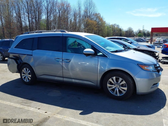 2016 Honda Odyssey SE with VIN 5FNRL5H38GB109733, listed as a IAAI auction lot 41882527 with 123,087 mi miles. Bid and sale history available at carsss.com. Image 14.