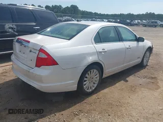 2010 Ford Fusion Hybrid with VIN 3FADP0L3XAR365084, listed as a IAAI auction lot 42521145 with 178,200 mi miles and . Bid and sale history available at DreamBid. Image 4.