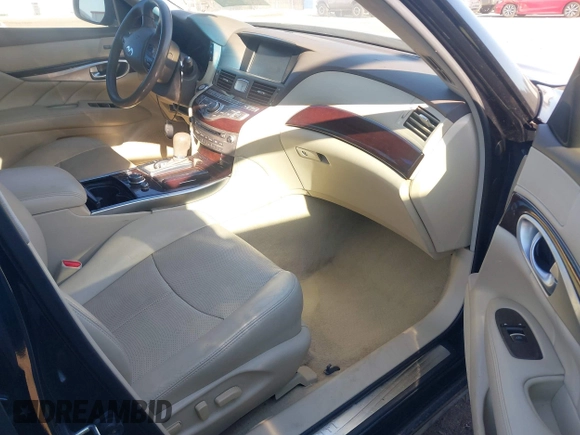 2015 Infiniti Q70 with VIN JN1BY1PP6FM600441, listed as a IAAI auction lot 41328735 with 156,402 mi miles and . Bid and sale history available at DreamBid. Image 5.