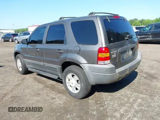 2004 Ford Escape XLT with VIN 1FMCU031X4DA18148, listed as a IAAI auction lot 42566498 with 264,092 mi miles and . Bid and sale history available at DreamBid. Image 3.