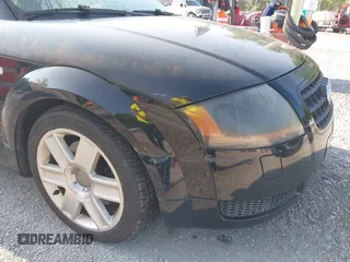 2004 Audi TT z VIN TRUTC28N241016061, wystawiony jako IAAI lot #42413028 z przebiegiem 175 236 mil mil oraz . Historia ofert i sprzedaży dostępna na DreamBid. Obrazek 6.