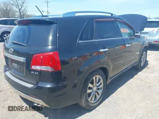 2012 Kia Sorento SX with VIN 5XYKW4A23CG230547, listed as a IAAI auction lot 41961371 with 203,450 mi miles. Bid and sale history available at carsss.com. Image 4.