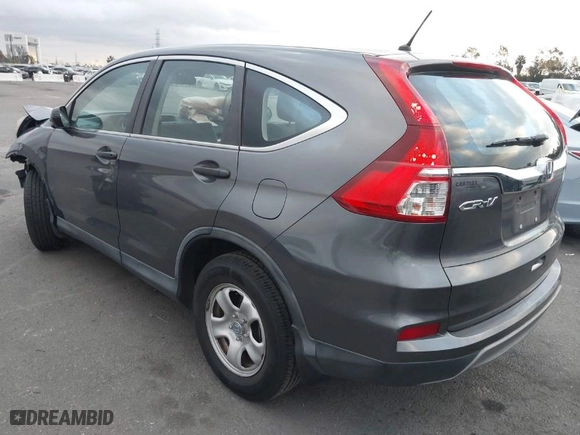 2015 Honda CR-V LX with VIN 3CZRM3H39FG706958, listed as a IAAI auction lot 41549880 with 85,567 mi miles. Bid and sale history available at carsss.com. Image 3.