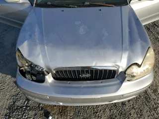 2005 Hyundai Sonata GLS with VIN KMHWF35H95A116657, listed as a Copart auction lot 77614154 with 101,164 mi miles and Salvage Title. Bid and sale history available at carsss.com. Image 12.