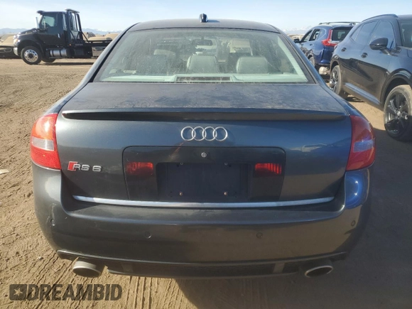 2003 Audi RS 6 z VIN WUAPV54B73N905368, wystawiony jako Copart lot #85366564 z przebiegiem 125 339 mil mil oraz Tytuł czysty. Historia ofert i sprzedaży dostępna na DreamBid. Obrazek 6.