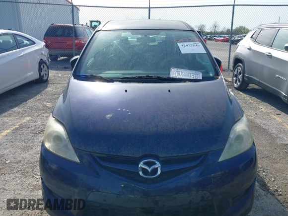 2010 Mazda 5 Sport with VIN JM1CR2W39A0388301, listed as a IAAI auction lot 42077549 with 128,371 mi miles and . Bid and sale history available at DreamBid. Image 6.