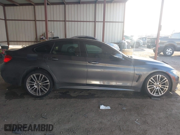 2015 BMW 4 Series 428i with VIN WBA4A5C54FG051307, listed as a IAAI auction lot 41774596 with 126,852 mi miles and . Bid and sale history available at carsss.com. Image 13.
