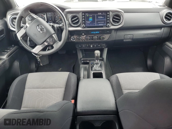 2023 Toyota Tacoma SR z VIN 3TMCZ5AN2PM583382, wystawiony jako Copart lot #58209775 z przebiegiem 17 442 mil mil oraz Szkoda całkowita • Salvage title. Historia ofert i sprzedaży dostępna na DreamBid. Obrazek 8.