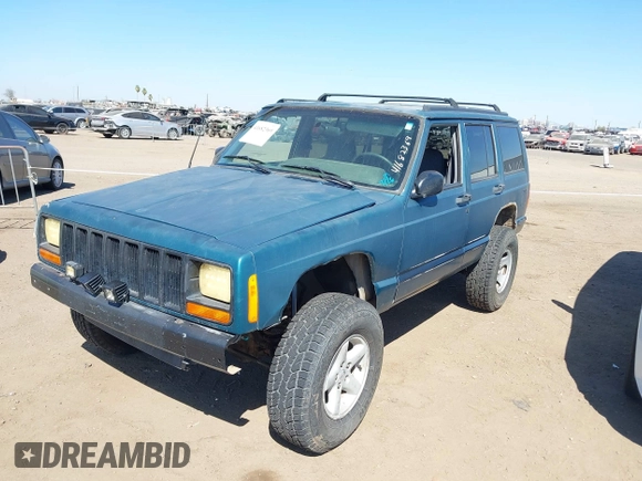 1997 Jeep Cherokee Sport with VIN 1J4FJ68S4VL592390, listed as a IAAI auction lot 41682369 with 194,624 mi miles. Bid and sale history available at carsss.com. Image 2.