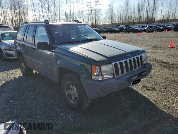 1996 Jeep Grand Cherokee Laredo with VIN 1J4GZ58S0TC245935, listed as a Copart auction lot 44782555 with 268,742 mi miles and Salvage Title. Bid and sale history available at carsss.com. Image 4.