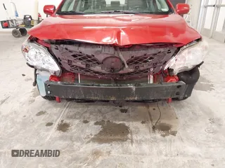 2011 Toyota Corolla L with VIN 2T1BU4EE7BC716220, listed as a IAAI auction lot 41901019 with 192,103 mi miles. Bid and sale history available at carsss.com. Image 6.