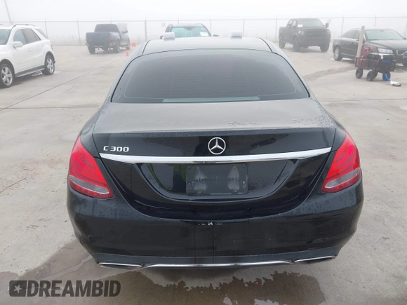2018 Mercedes-Benz C 300 with VIN 55SWF4JB8JU234808, listed as a IAAI auction lot 41869594 with 220,883 mi miles and . Bid and sale history available at carsss.com. Image 16.