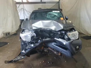 2013 Toyota Tacoma z VIN 5TFLU4ENXDX061110, wystawiony jako Copart lot #58910865 z przebiegiem Nie podano mil oraz Szkoda całkowita • Salvage title. Historia ofert i sprzedaży dostępna na DreamBid. Obrazek 5.