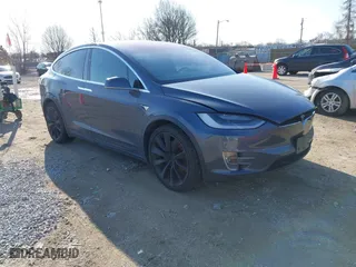 2020 Tesla Model X Long Range with VIN 5YJXCBE2XLF230629, listed as a IAAI auction lot 41925961 with 35,979 mi miles. Bid and sale history available at carsss.com. Image 1.