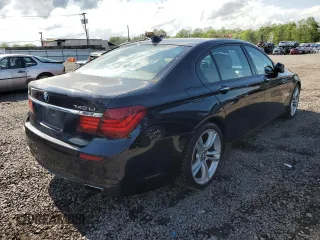 2014 BMW 7 Series 740Li xDrive z VIN WBAYF4C58ED281817, wystawiony jako Copart lot #55755815 z przebiegiem 112 398 mil mil oraz Szkoda całkowita • Salvage title. Historia ofert i sprzedaży dostępna na DreamBid. Obrazek 3.