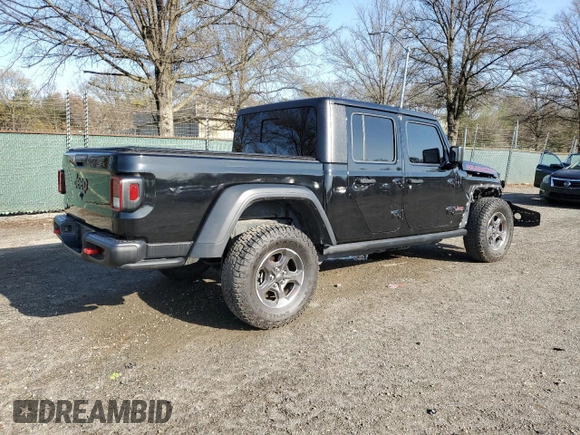 2020 Jeep Gladiator Rubicon z VIN 1C6JJTBG9LL184085, wystawiony jako Copart lot #51382115 z przebiegiem 83 375 mil mil oraz Szkoda całkowita • Salvage title. Historia ofert i sprzedaży dostępna na DreamBid. Obrazek 3.