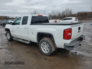 2019 GMC Sierra 1500 Limited SLE with VIN 2GTV2MEC1K1182101, listed as a Copart auction lot 43940555 with 89,520 mi miles and Salvage Title. Bid and sale history available at carsss.com. Image 2.