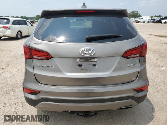 2017 Hyundai Santa Fe 2.4L with VIN 5NMZT3LB1HH010884, listed as a Copart auction lot 59098695 with 81,331 mi miles and Salvage title. Bid and sale history available at DreamBid. Image 6.