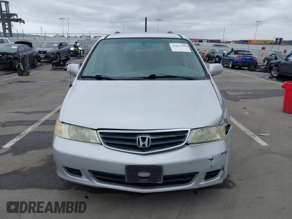 2003 Honda Odyssey EX-L with VIN 5FNRL18943B030373, listed as a IAAI auction lot 41867289 with 179,718 mi miles and . Bid and sale history available at DreamBid. Image 12.