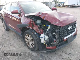 2019 Hyundai Tucson SE with VIN KM8J2CA49KU881841, listed as a IAAI auction lot 41099575 with 129,153 mi miles. Bid and sale history available at carsss.com. Image 6.