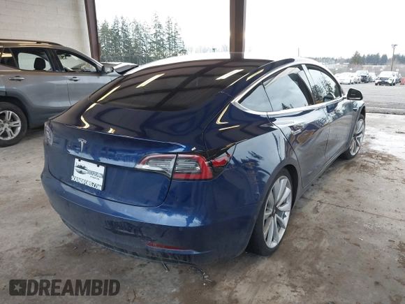 2018 Tesla Model 3 Long Range Battery z VIN 5YJ3E1EA7JF035949, wystawiony jako IAAI lot #41627027 z przebiegiem Nie podano mil oraz . Historia ofert i sprzedaży dostępna na DreamBid. Obrazek 4.