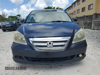 2007 Honda Odyssey LX z VIN 5FNRL382X7B082143, wystawiony jako Copart lot #61271825 z przebiegiem 236 594 mil mil oraz Szkoda całkowita • Salvage title. Historia ofert i sprzedaży dostępna na DreamBid. Obrazek 5.