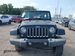 2016 Jeep Wrangler Unlimited Sahara with VIN 1C4BJWEG8GL333876, listed as a IAAI auction lot 42314351 with 163,889 mi miles and . Bid and sale history available at DreamBid. Image 12.