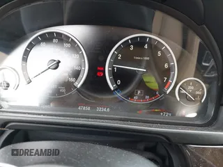2013 BMW 5 Series 528i xDrive with VIN WBAXH5C54DD107317, listed as a IAAI auction lot 42244446 with 47,858 mi miles and . Bid and sale history available at DreamBid. Image 7.