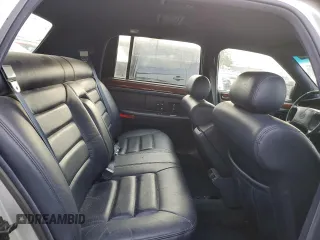 1994 Cadillac Concours z VIN 1G6KF52Y3RU231877, wystawiony jako Copart lot #82150174 z przebiegiem 76 279 mil mil oraz Szkody całkowita. Historia ofert i sprzedaży dostępna na DreamBid. Obrazek 10.