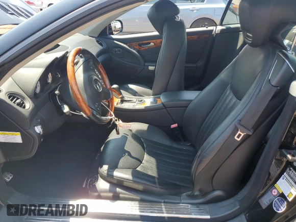 2009 Mercedes-Benz SL 550 with VIN WDBSK71F79F146967, listed as a Copart auction lot 62679494 with 57,412 mi miles and Salvage title. Bid and sale history available at DreamBid. Image 7.