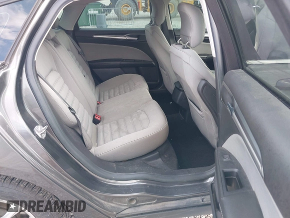 2015 Ford Fusion S with VIN 3FA6P0G75FR134560, listed as a IAAI auction lot 41950540 with 107,070 mi miles and . Bid and sale history available at DreamBid. Image 8.