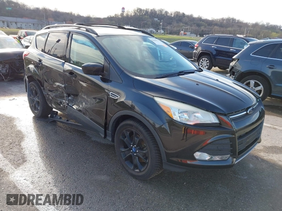 2013 Ford Escape SE with VIN 1FMCU9GX9DUB92246, listed as a IAAI auction lot 41808372 with 73,472 mi miles. Bid and sale history available at carsss.com. Image 1.