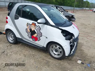 2014 Smart fortwo Pure with VIN WMEEJ3BA2EK733819, listed as a IAAI auction lot 42041305 with 69,018 mi miles and . Bid and sale history available at DreamBid. Image 1.