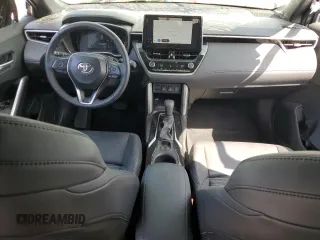 2024 Toyota Corolla Cross Hybrid S with VIN 7MUFBABG7RV043044, listed as a Copart auction lot 61828715 with 10,473 mi miles and Salvage title. Bid and sale history available at DreamBid. Image 8.