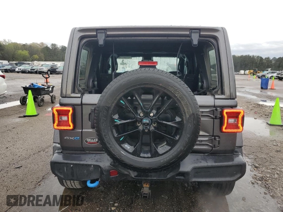 2021 Jeep Wrangler Unlimited Sahara with VIN 1C4JJXP6XMW643026, listed as a Copart auction lot 49960415 with 43,733 mi miles and Salvage Title. Bid and sale history available at DreamBid. Image 6.