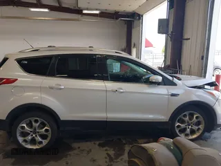 2013 Ford Escape Titanium with VIN 1FMCU9J96DUC60268, listed as a IAAI auction lot 42095407 with 105,307 mi miles and . Bid and sale history available at DreamBid. Image 13.