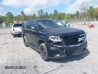 2016 Chevrolet Tahoe Commercial z VIN 1GNLCDECXGR119833, wystawiony jako IAAI lot #41957527 z przebiegiem 248 855 mil mil oraz . Historia ofert i sprzedaży dostępna na DreamBid. Obrazek 1.