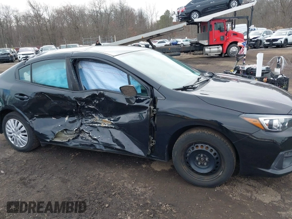2020 Subaru Impreza with VIN 4S3GKAB69L3602396, listed as a IAAI auction lot 41621494 with 63,952 mi miles and . Bid and sale history available at DreamBid. Image 17.