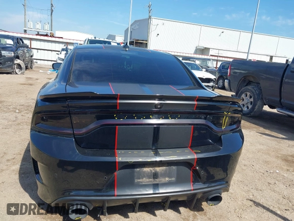 2019 Dodge Charger R/T with VIN 2C3CDXCT2KH575297, listed as a IAAI auction lot 41661339 with 119,854 mi miles and . Bid and sale history available at DreamBid. Image 16.