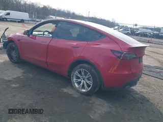 2023 Tesla Model Y Long Range with VIN 7SAYGDEE7PF672887, listed as a IAAI auction lot 41744398 with Not Provided miles. Bid and sale history available at carsss.com. Image 3.