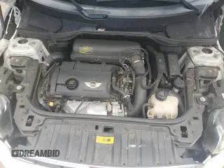 2014 MINI Countryman S z VIN WMWZC3C57EWP51864, wystawiony jako Copart lot #71233944 z przebiegiem 73 828 mil mil oraz Szkoda całkowita • Salvage title. Historia ofert i sprzedaży dostępna na DreamBid. Obrazek 11.