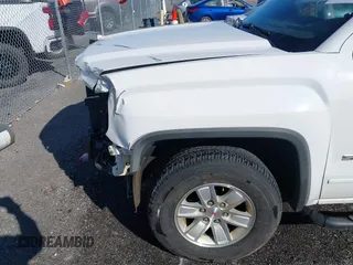 2017 GMC Sierra 1500 SLE z VIN 3GTP1MEC4HG332553, wystawiony jako IAAI lot #41721263 z przebiegiem 172 724 mil mil oraz . Historia ofert i sprzedaży dostępna na DreamBid. Obrazek 17.