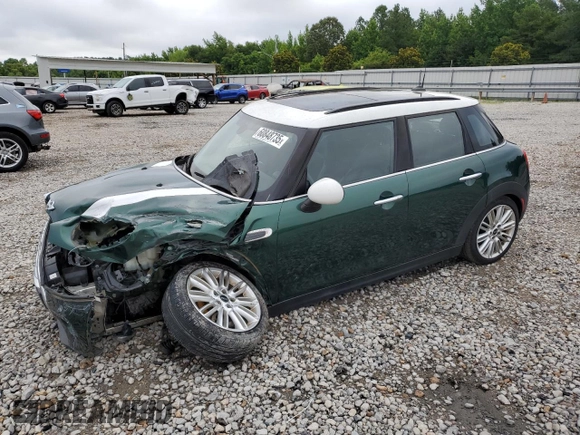 2018 MINI Hardtop 4 Door Cooper with VIN WMWXU1C56J2F79128, listed as a Copart auction lot 60848735 with 35,392 mi miles and Salvage title. Bid and sale history available at DreamBid. Image 1.
