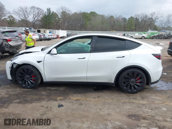 2024 Tesla Model Y Performance with VIN 7SAYGDEF4RA278532, listed as a IAAI auction lot 41511769 with 9,487 mi miles and . Bid and sale history available at DreamBid. Image 13.