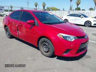 2015 Toyota Corolla L z VIN 5YFBURHE4FP282563, wystawiony jako IAAI lot #42328654 z przebiegiem 98 738 mil mil oraz . Historia ofert i sprzedaży dostępna na DreamBid. Obrazek 1.