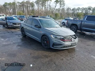 2020 Volkswagen Jetta GLI S z VIN 3VW5T7BU1LM078128, wystawiony jako IAAI lot #41401273 z przebiegiem 80 889 mil mil oraz . Historia ofert i sprzedaży dostępna na DreamBid. Obrazek 1.