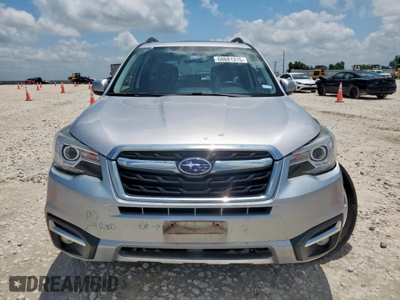 2017 Subaru Forester Touring z VIN JF2SJAWC0HH566901, wystawiony jako Copart lot #60681315 z przebiegiem 70 062 mil mil oraz Szkoda całkowita • Salvage title. Historia ofert i sprzedaży dostępna na DreamBid. Obrazek 5.