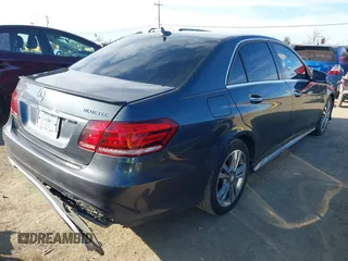 2014 Mercedes-Benz E-Class E 250 BlueTEC Luxury with VIN WDDHF0EB0EA876408, listed as a IAAI auction lot 41614679 with 283,695 mi miles. Bid and sale history available at carsss.com. Image 4.