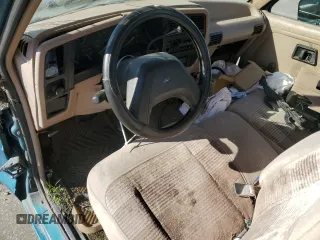 1992 Ford Ranger with VIN 1FTCR10A3NTA81065, listed as a Copart auction lot 74002434 with 9,827 mi miles and Salvage Title. Bid and sale history available at carsss.com. Image 8.
